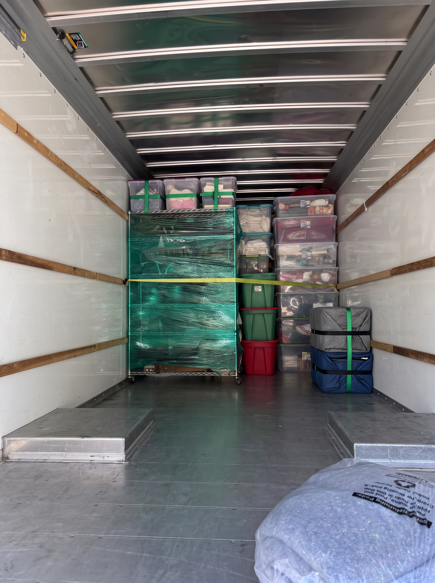 Professionally packed and organized LMC moving truck interior